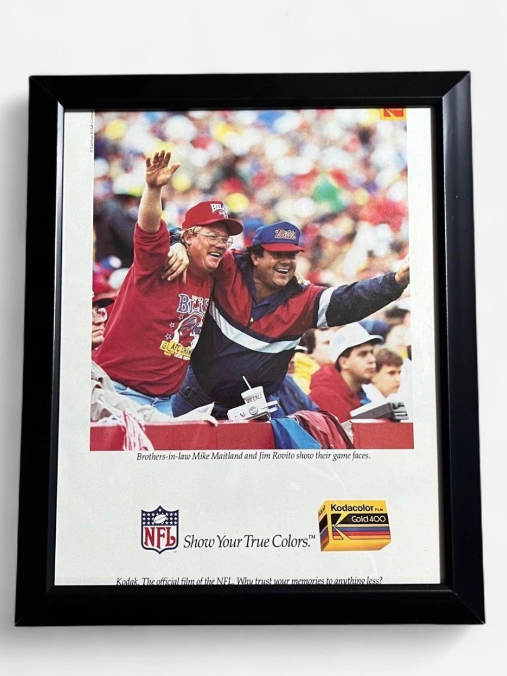 Vintage Black Framed NFL Poster with Red and Blue Accents